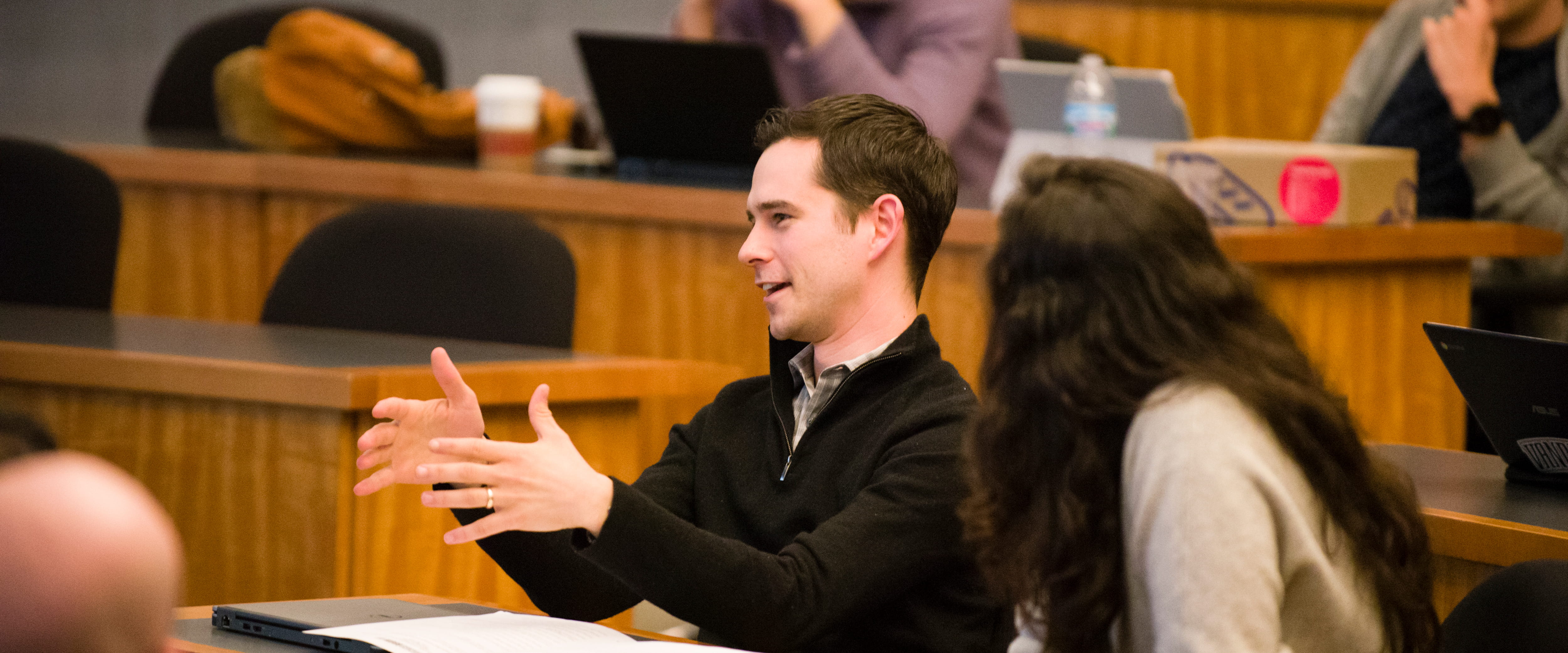 Woman presenting to a group for the SNVC challenge