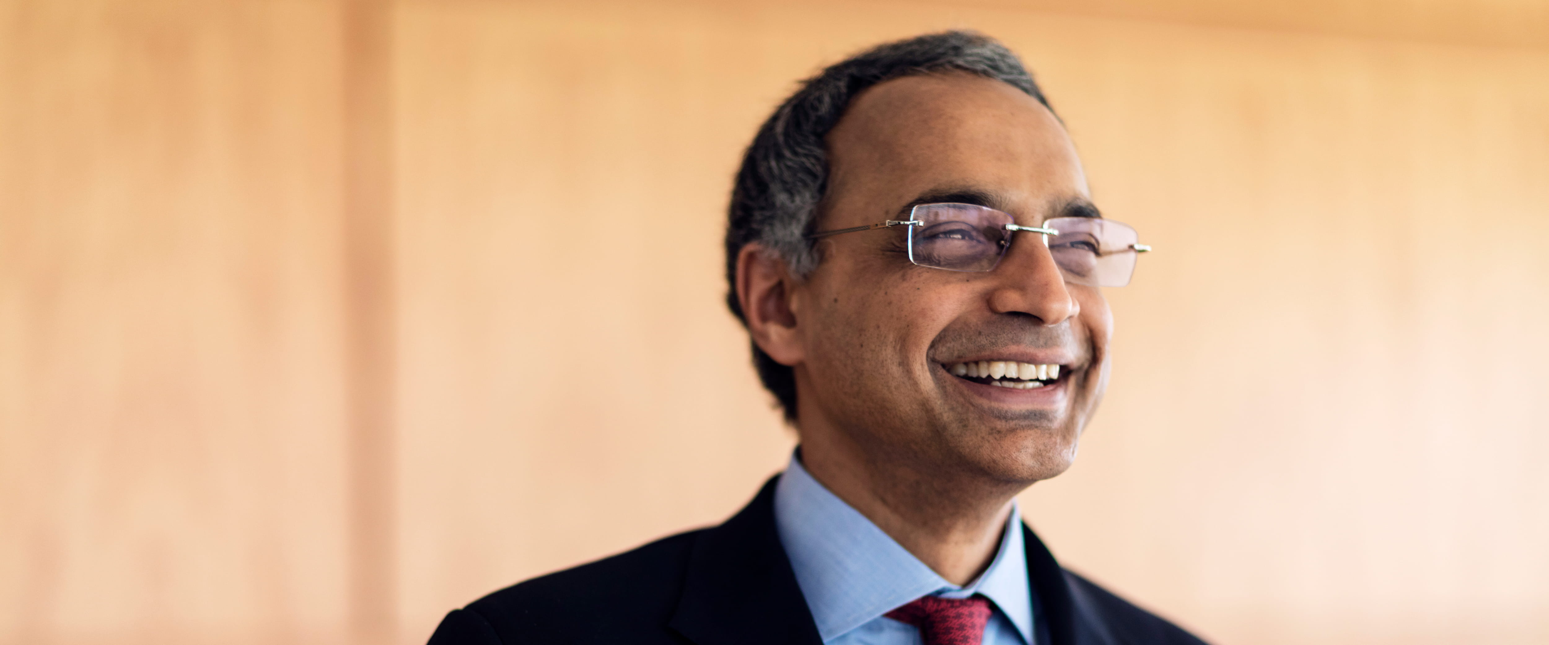 Dean Madhav Rajan smiling