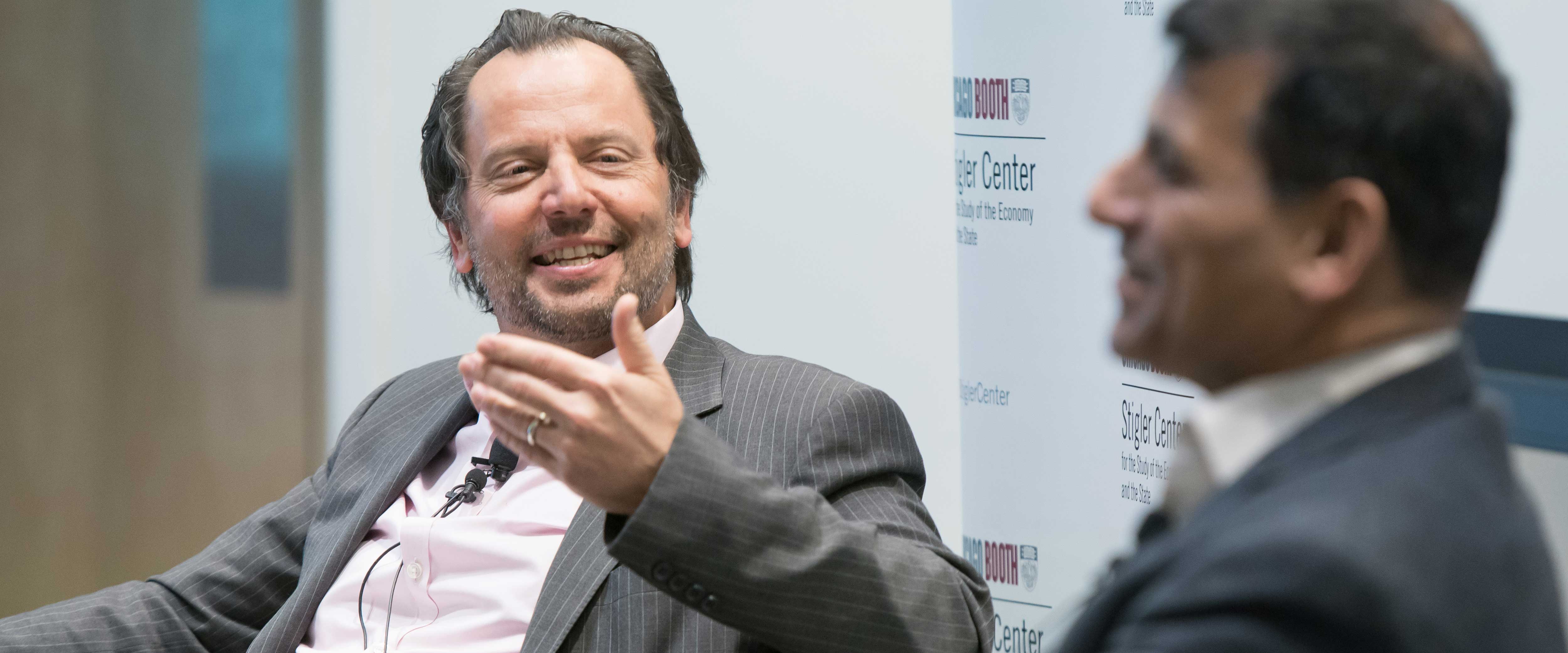 Luigi Zingales and Raghuram Rajan at an event