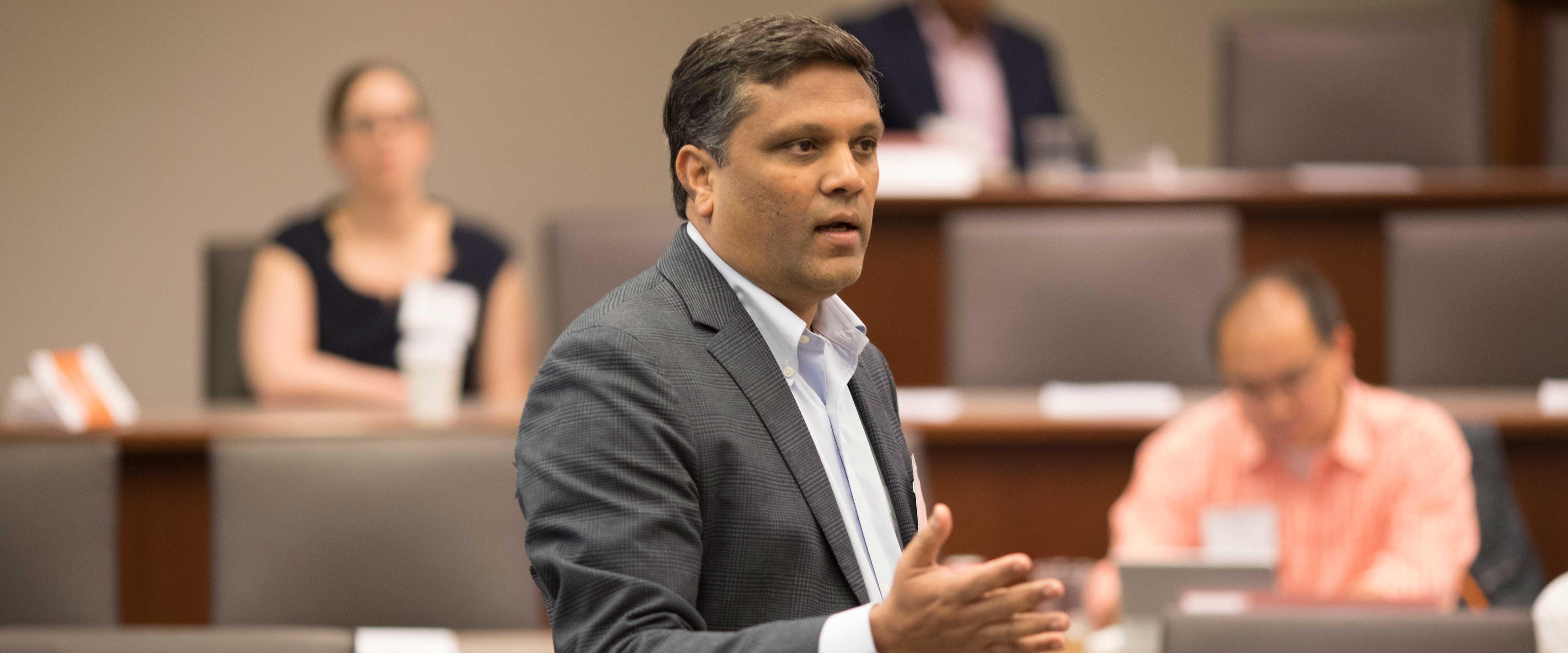 Sanjog Misra lecturing at the Harper Center