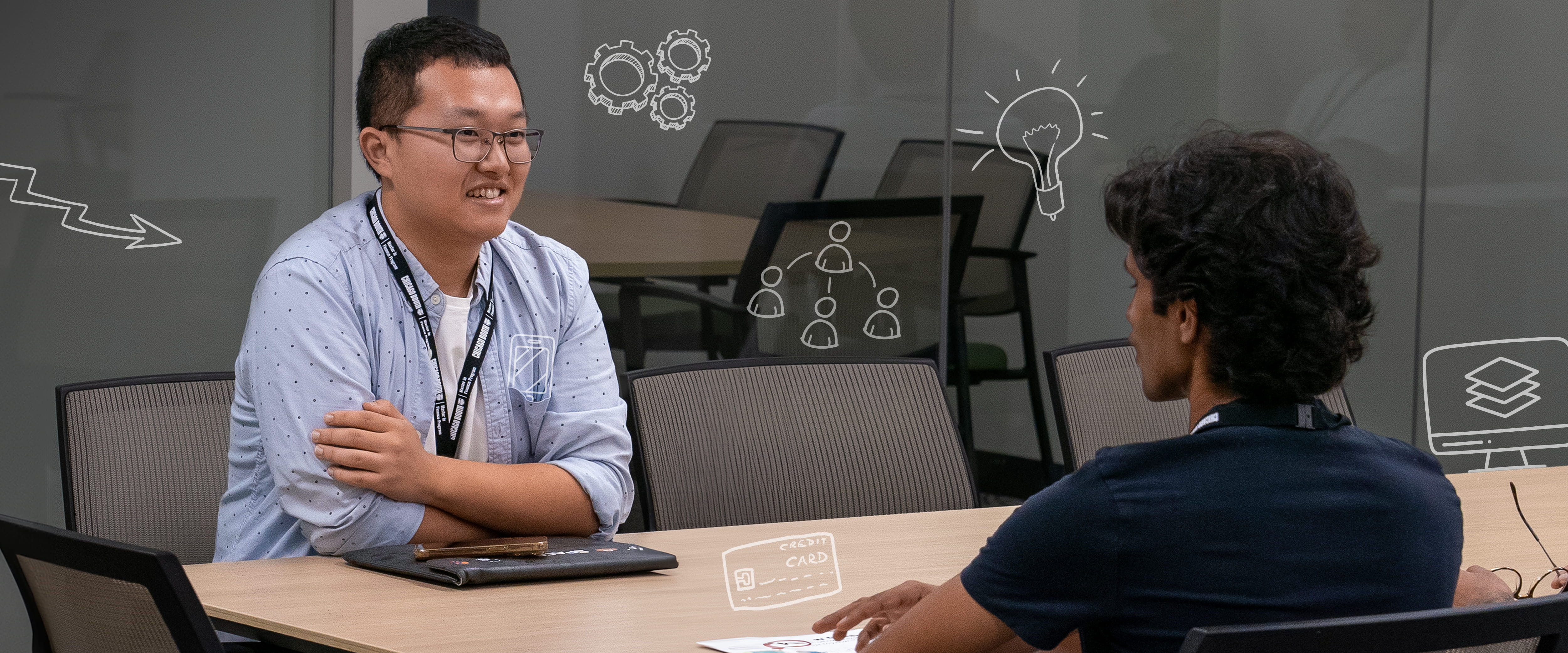 Master in Finance students collaborating in a conference room