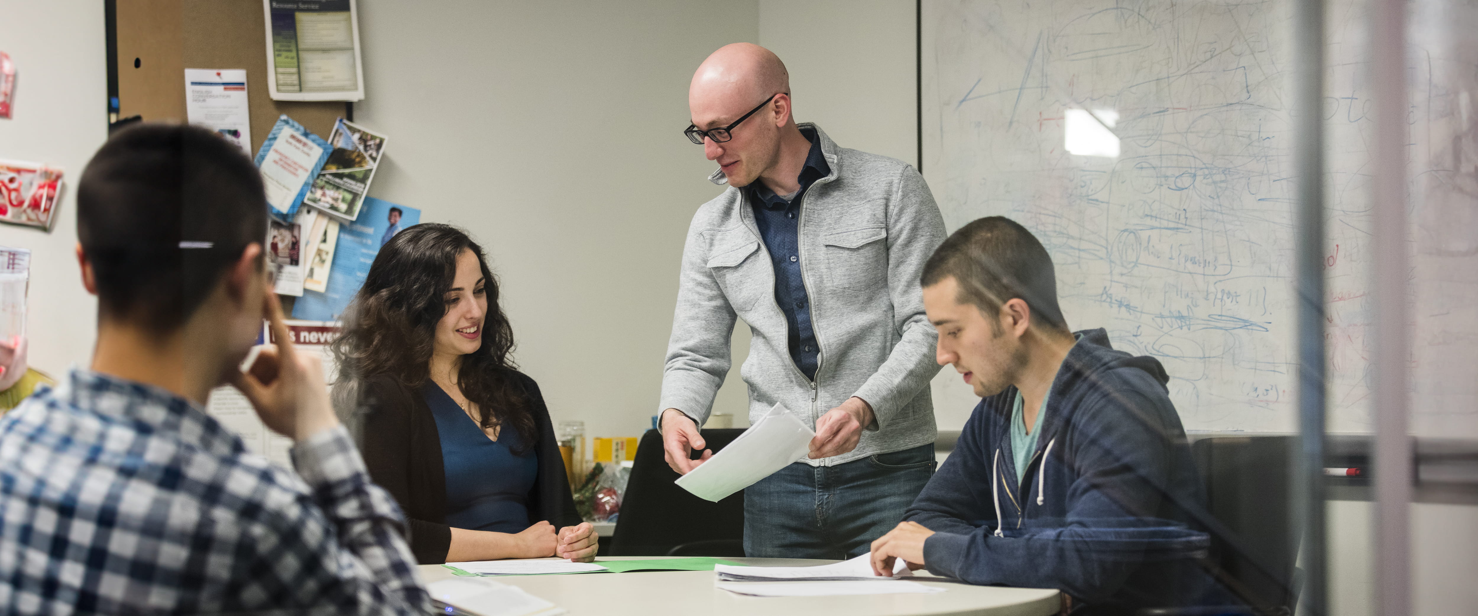 Students working together in a room. 