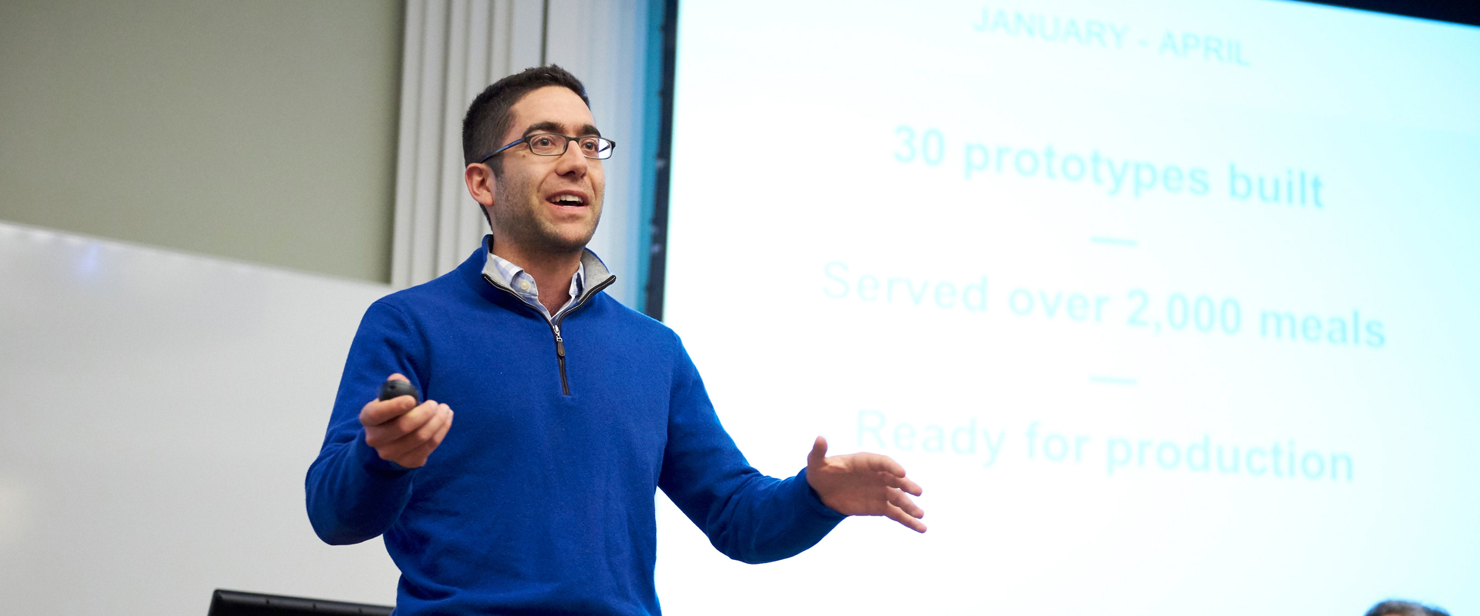 David Rabie, the co-founder and CEO of Tovala, addresses the audience during a Back to the Classroom session as part of the Booth Reconnect weekend at the Harper Center 
