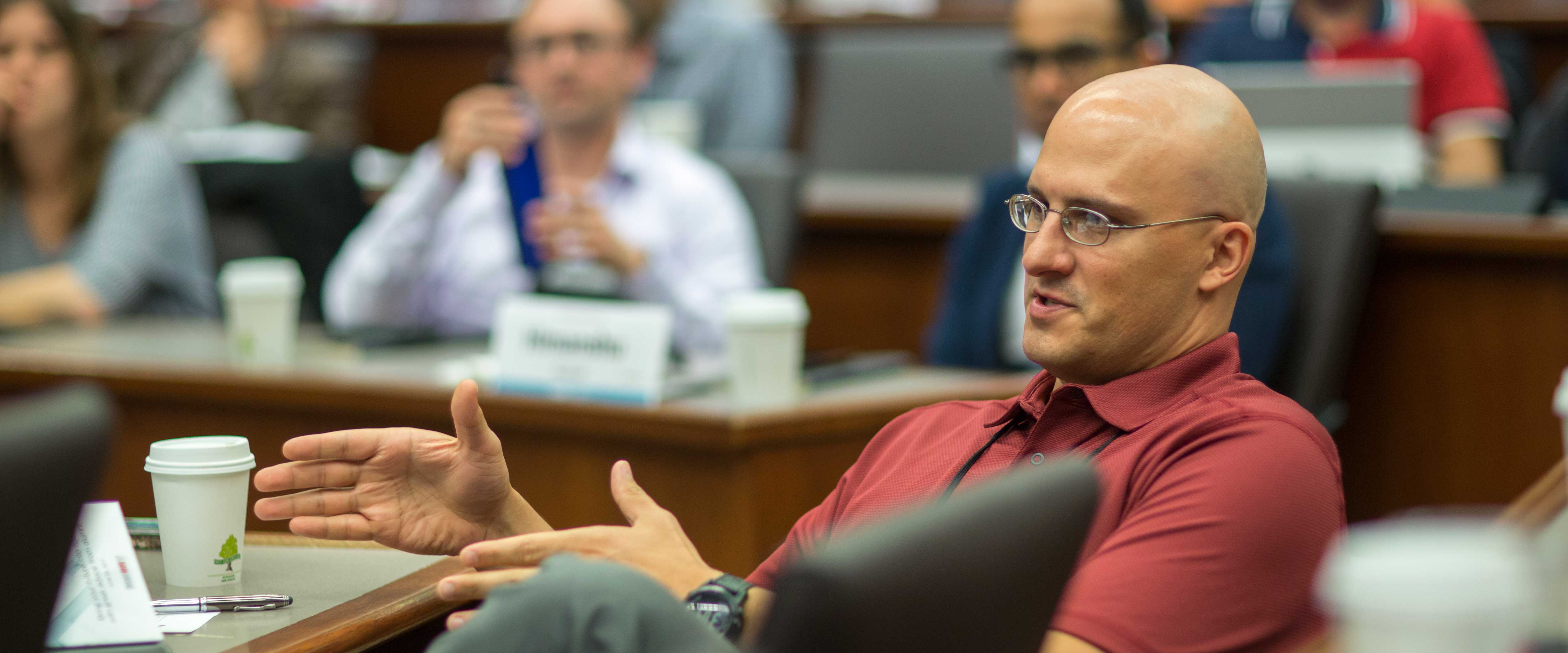 Chicago Booth program man in class