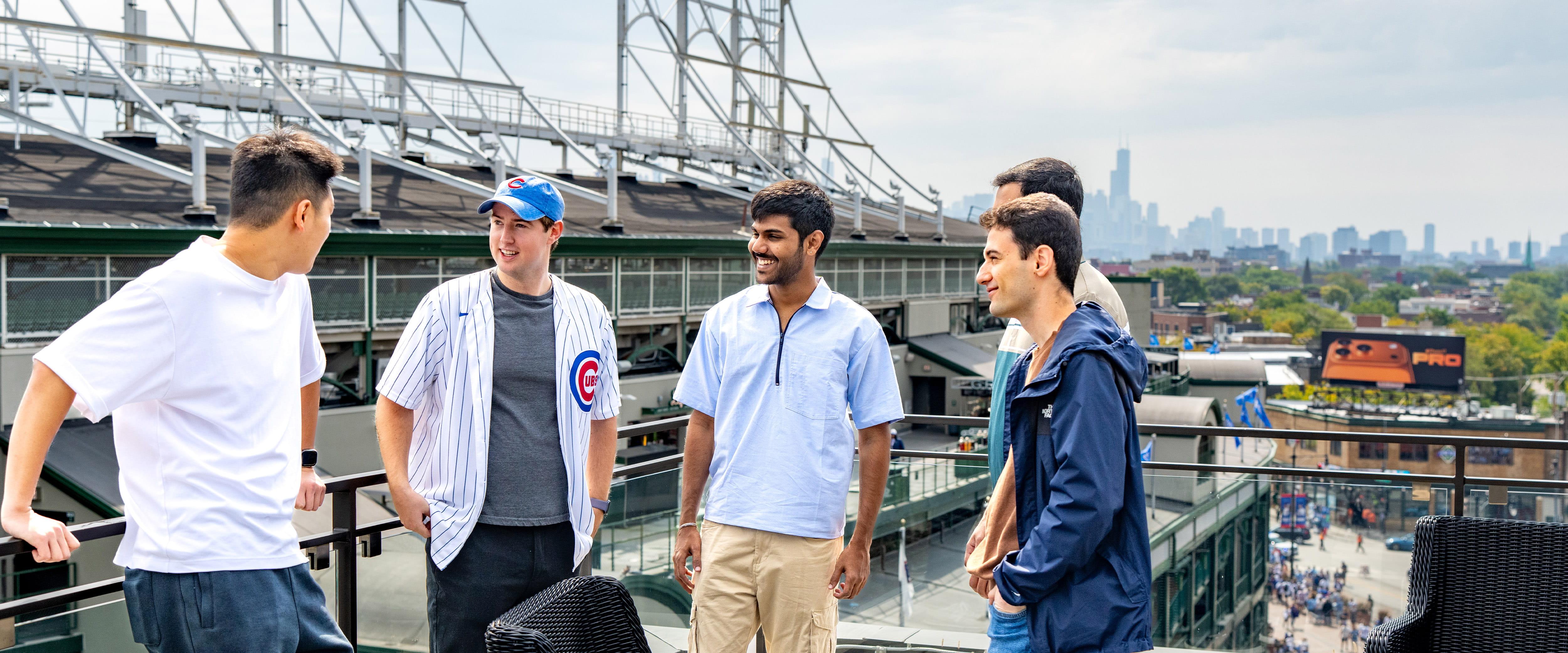 Students socializing by the Cubs stadium.
