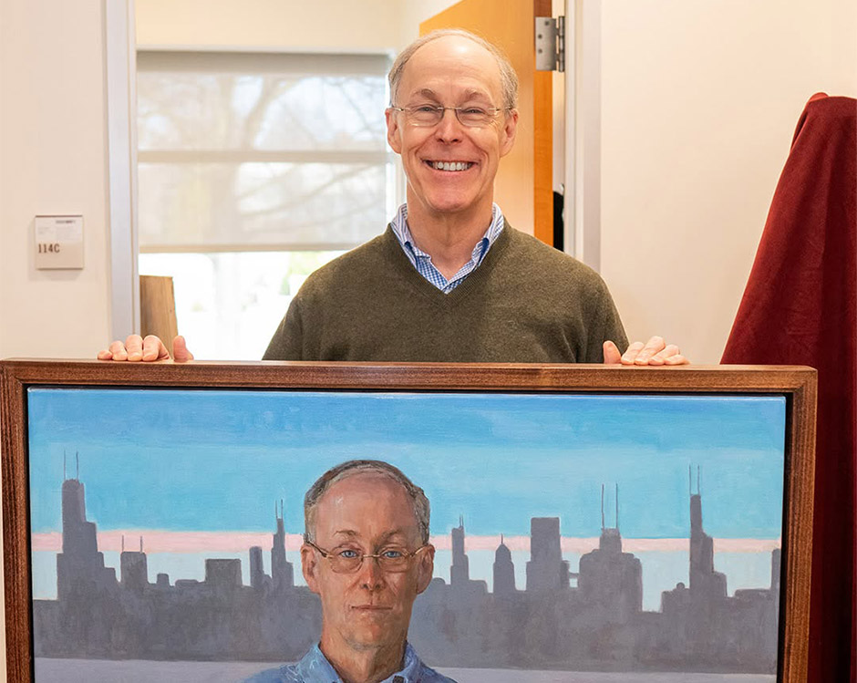 Douglas Diamond poses with his Nobel portrait.