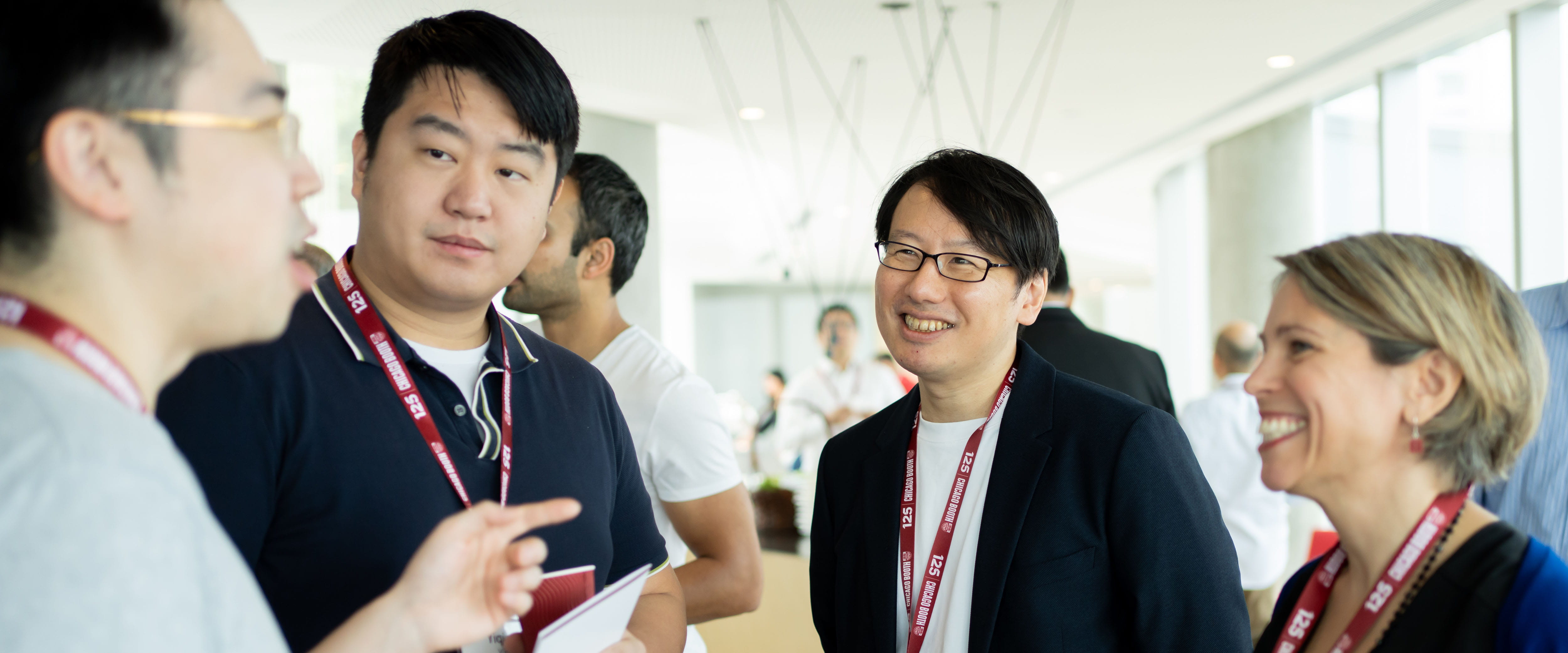 Chicago Booth EMBA students in Hong Kong socializing at an event